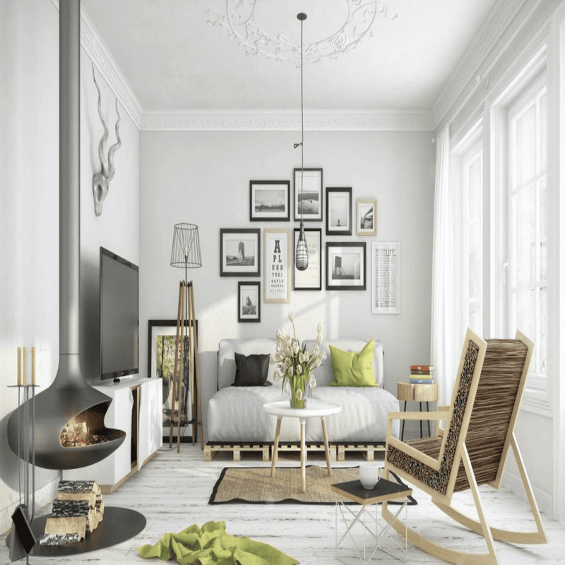 Modern living room featuring a minimalist design with white walls, light wooden flooring, and a sleek wood-burning fireplace.