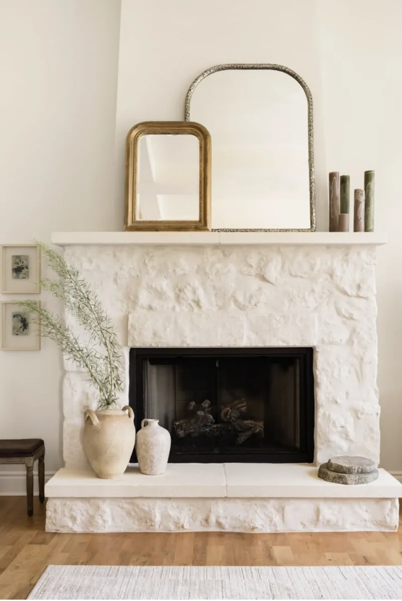 A living area with a tiled fireplace from a Designed | Curated American River whole-home renovation