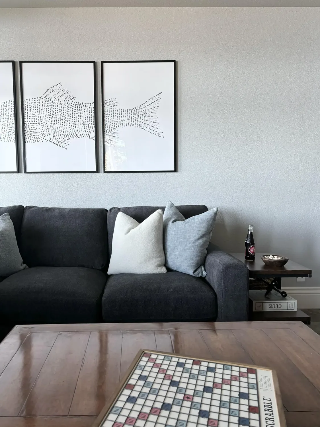A living area with a tiled fireplace from a Designed | Curated American River whole-home renovation