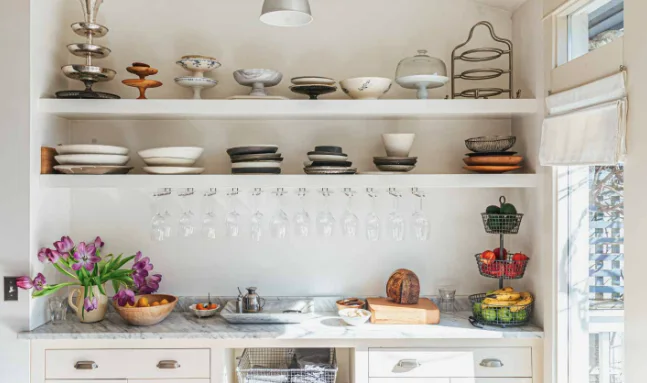 Scullery open shelving styled with everyday dishware, glassware and produce