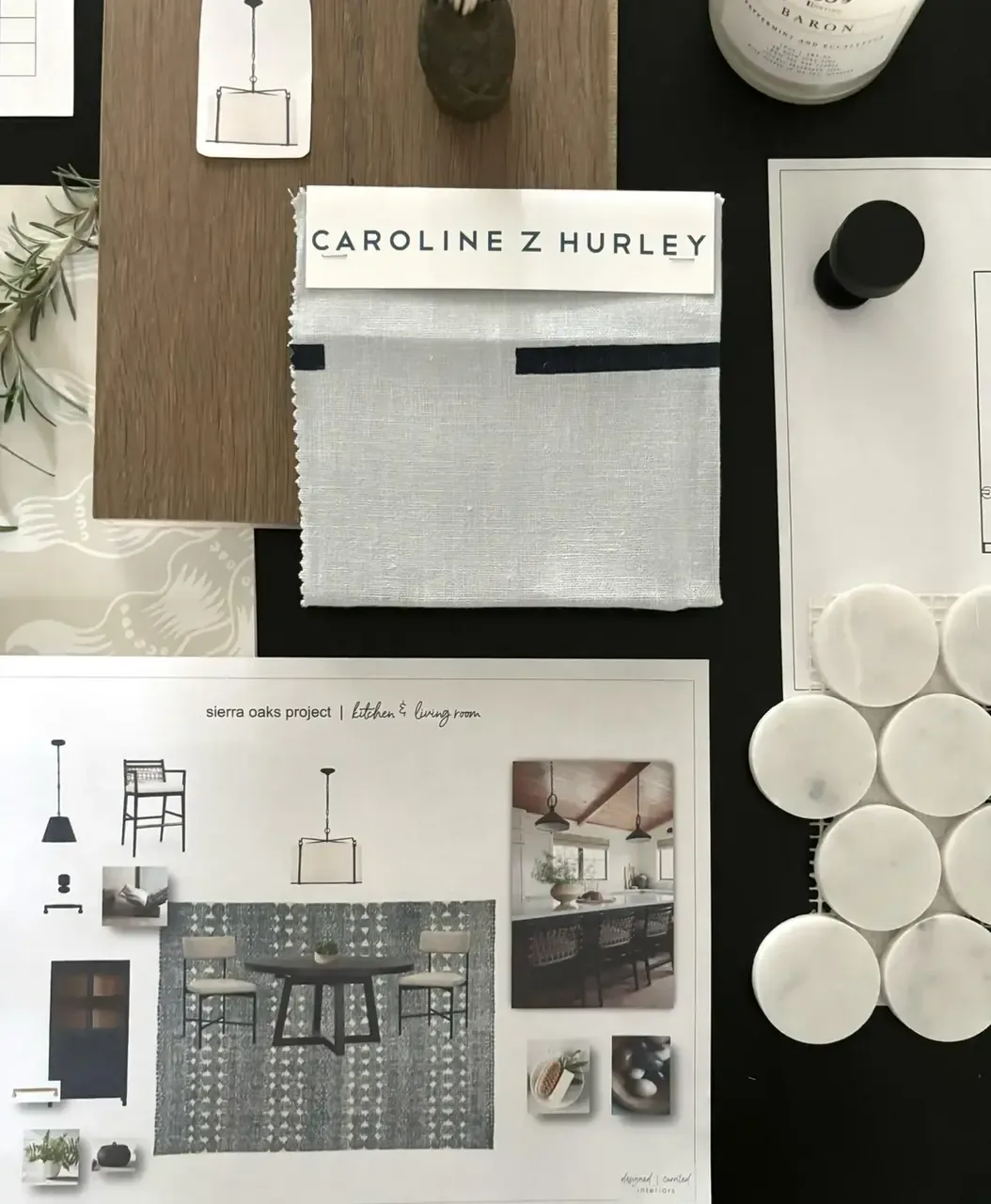 A flat lay of interior design materials and a mood board for a kitchen and living room project featuring fabric