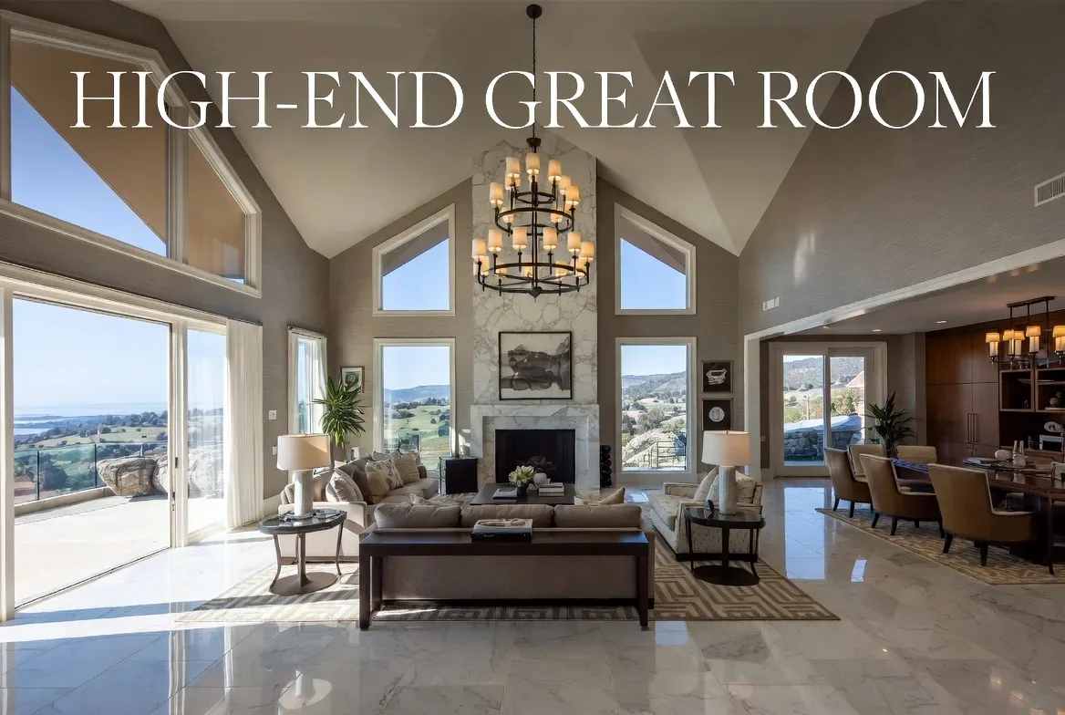 A spacious, high-end great room with large windows, a marble fireplace, modern chandelier, and an open view to a dining area and outdoor landscape