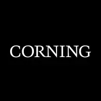 A black background with the word 'CORNING' in white capital letters centered